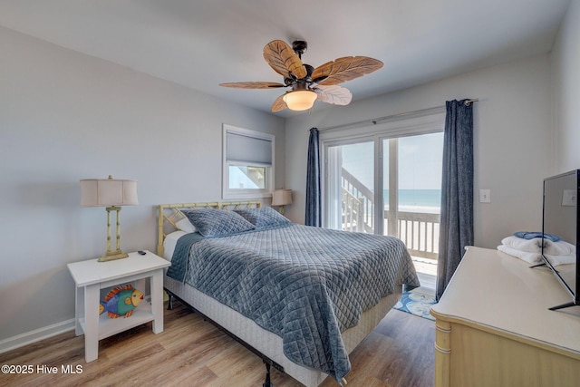 2006 N Shore Dr Unit B, Surf City, NC 28445 - bedroom with access to exterior, light wood-type flooring, baseboards, and ceiling fan