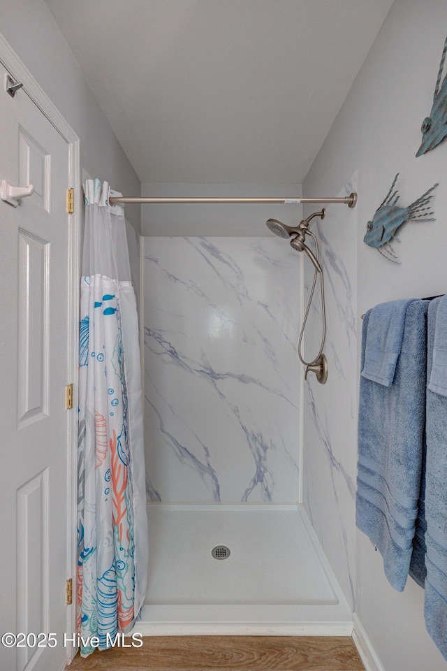 2006 N Shore Dr Unit B, Surf City, NC 28445 - bathroom featuring a marble finish shower