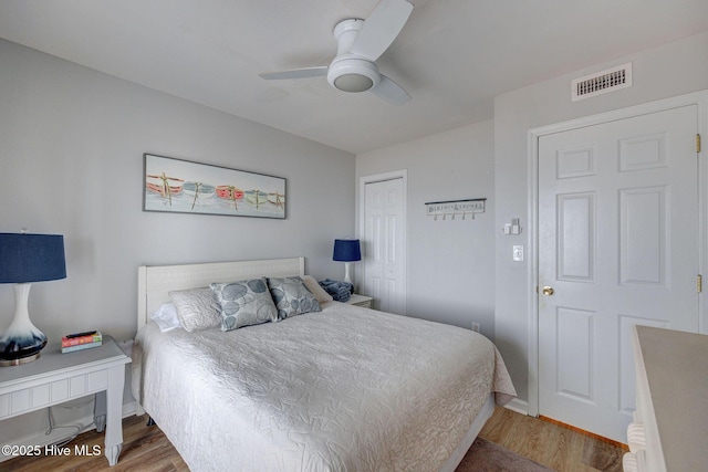 2006 N Shore Dr Unit B, Surf City, NC 28445 - bedroom featuring wood finished floors, a closet, and ceiling fan