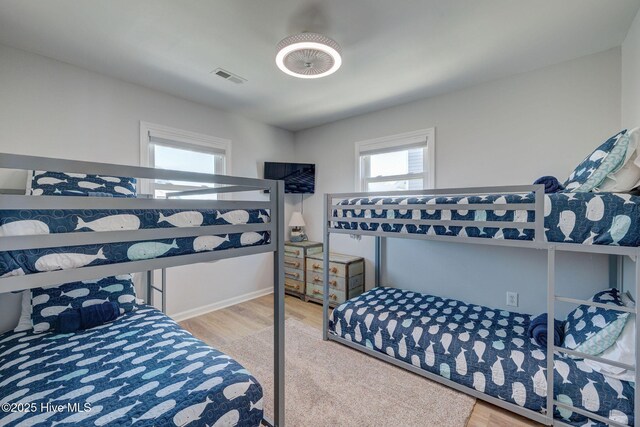 2006 N Shore Dr Unit B, Surf City, NC 28445 - bedroom with wood finished floors and baseboards