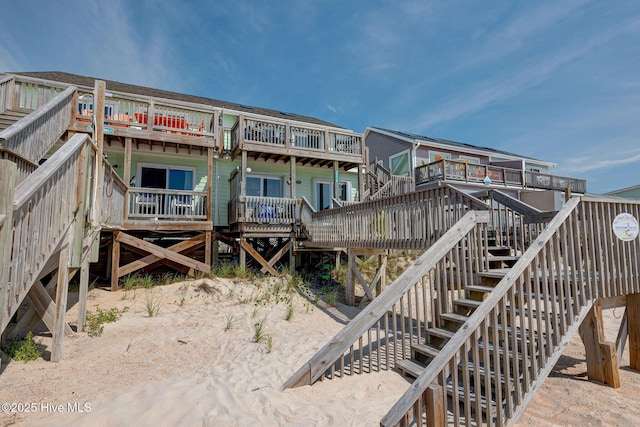 2006 N Shore Dr Unit B, Surf City, NC 28445 - back of property with stairs and a wooden deck