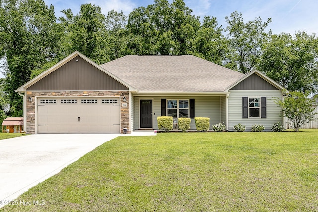 302 Boxwood Ct, Jacksonville, NC 28540 - ranch-style house featuring an attached garage, a shingled roof, driveway, and a front yard
