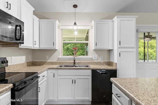 302 Boxwood Ct, Jacksonville, NC 28540 - kitchen featuring black appliances, a sink, and white cabinets