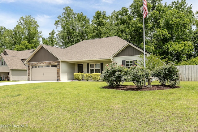 302 Boxwood Ct, Jacksonville, NC 28540 - view of front of home featuring board and batten siding, an attached garage, concrete driveway, a shingled roof, and stone siding