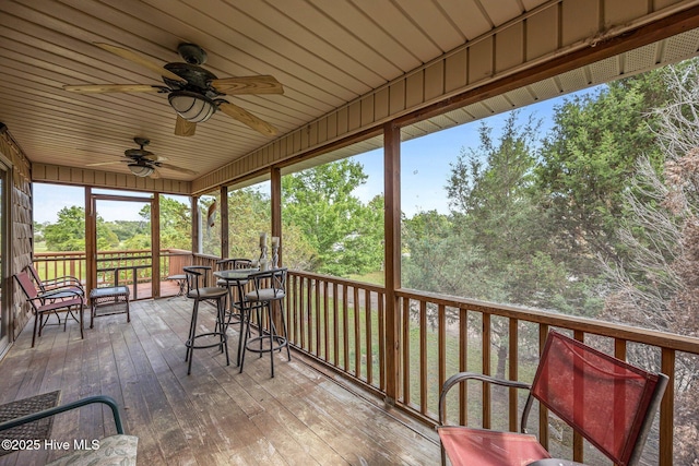 1005 Pirate Cove Cir, Oriental, NC 28571 - deck with ceiling fan and view of wooded area