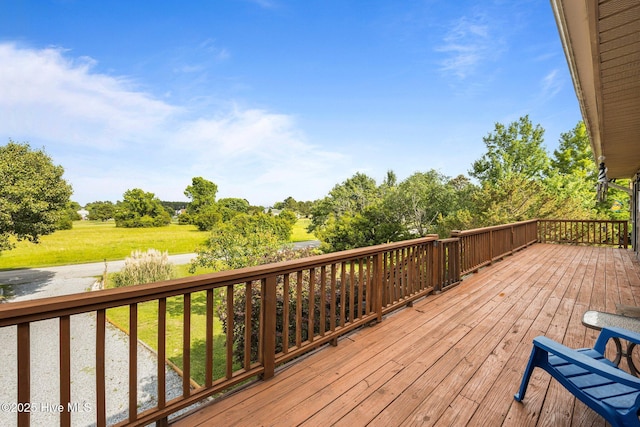 1005 Pirate Cove Cir, Oriental, NC 28571 - wooden terrace featuring a yard and view of wooded area