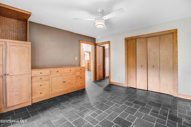 4969 Redman Rd, Rocky Mount, NC 27803 - unfurnished bedroom with a closet and ceiling fan