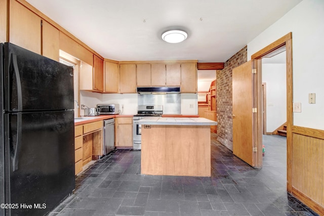 4969 Redman Rd, Rocky Mount, NC 27803 - kitchen featuring stainless steel appliances, under cabinet range hood, a center island, light brown cabinets, and tile counters