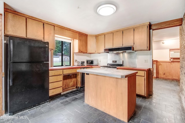4969 Redman Rd, Rocky Mount, NC 27803 - kitchen featuring stainless steel appliances, under cabinet range hood, tile countertops, dark stone finish floors, and a kitchen island