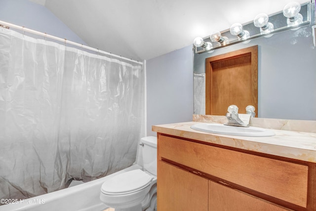 4969 Redman Rd, Rocky Mount, NC 27803 - bathroom featuring vaulted ceiling, toilet, and vanity