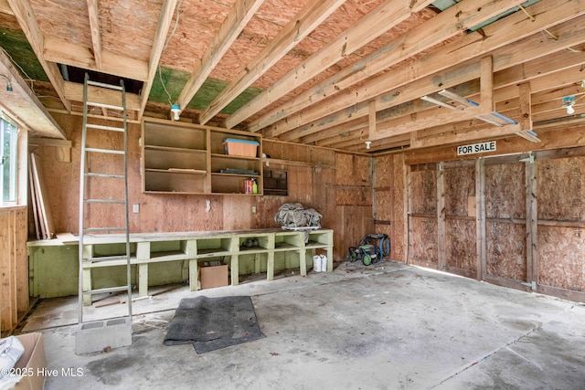 4969 Redman Rd, Rocky Mount, NC 27803 - miscellaneous room with unfinished concrete floors