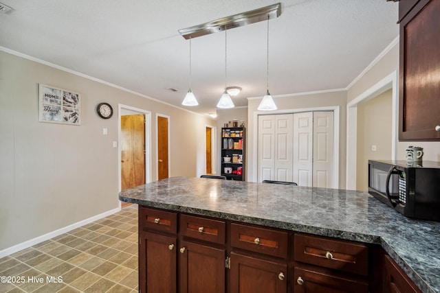 460 S NC-111 Hwy, Chinquapin, NC 28521 - kitchen with black microwave, a peninsula, dark countertops, ornamental molding, and baseboards