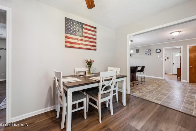460 S NC-111 Hwy, Chinquapin, NC 28521 - dining space featuring wood finished floors, baseboards, and ceiling fan