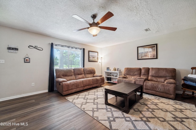 460 S NC-111 Hwy, Chinquapin, NC 28521 - living area with wood finished floors, ceiling fan, a textured ceiling, and baseboards