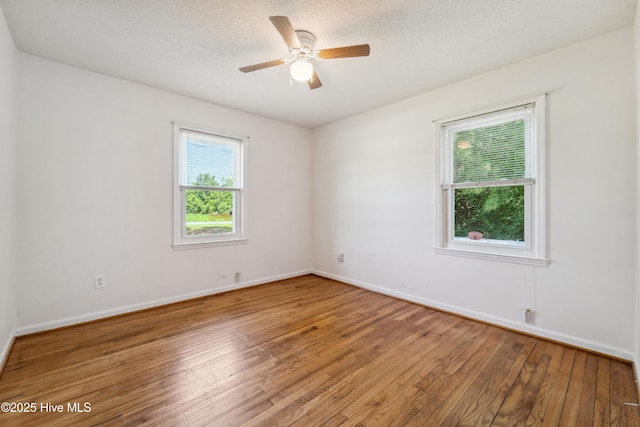 460 S NC-111 Hwy, Chinquapin, NC 28521 - spare room featuring light wood finished floors, baseboards, and a ceiling fan