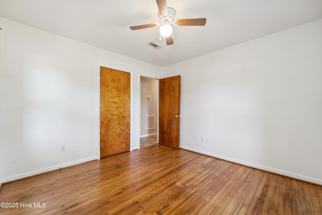 460 S NC-111 Hwy, Chinquapin, NC 28521 - spare room with wood finished floors, baseboards, and a ceiling fan