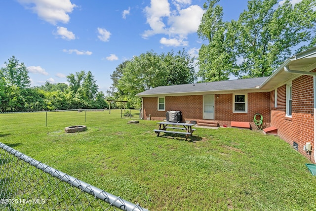 460 S NC-111 Hwy, Chinquapin, NC 28521 - view of yard featuring a fire pit and entry steps