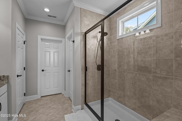 711 Lanyard Dr, Newport, NC 28570 - full bathroom featuring crown molding, a stall shower, vanity, tile patterned floors, and baseboards