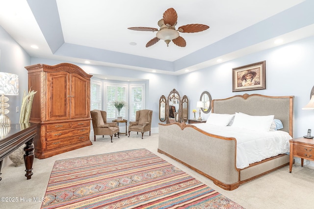 291 Live Oak Rd, Newport, NC 28570 - bedroom featuring light colored carpet, a tray ceiling, recessed lighting, and a ceiling fan