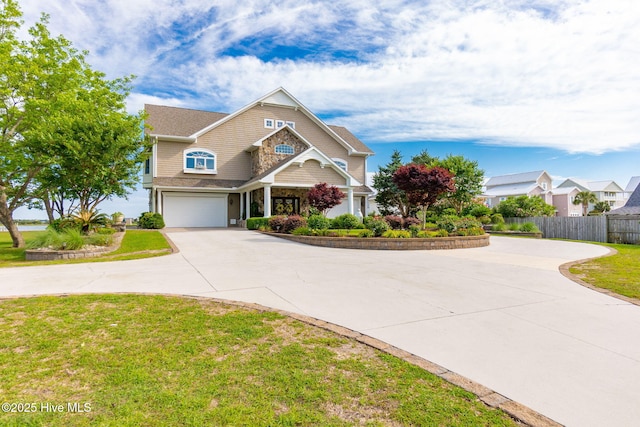 291 Live Oak Rd, Newport, NC 28570 - craftsman-style house featuring curved driveway and a garage
