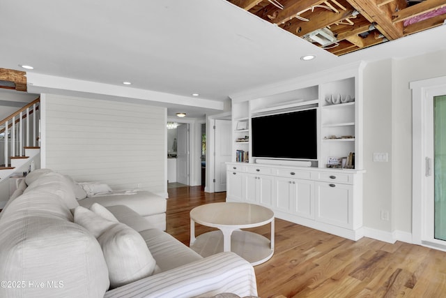1205 Kings Lndg, Hampstead, NC 28443 - living area featuring light wood-type flooring, stairway, recessed lighting, and baseboards