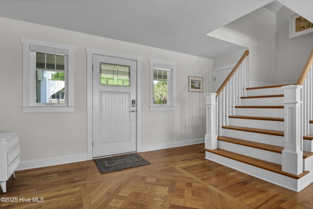 1205 Kings Lndg, Hampstead, NC 28443 - entryway with stairway and baseboards