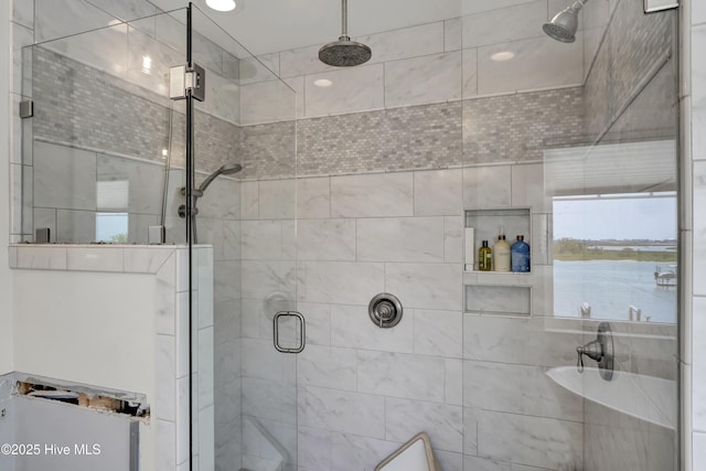 1205 Kings Lndg, Hampstead, NC 28443 - bathroom featuring a stall shower and recessed lighting