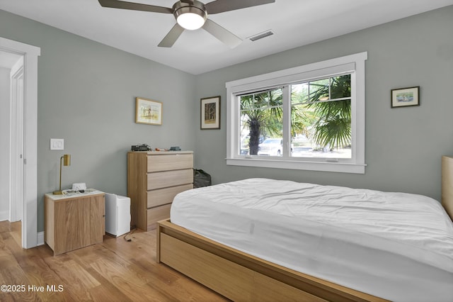 1205 Kings Lndg, Hampstead, NC 28443 - bedroom with wood finished floors and a ceiling fan