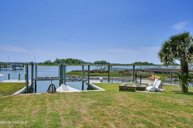 1205 Kings Lndg, Hampstead, NC 28443 - dock area featuring a yard, boat lift, and a water view