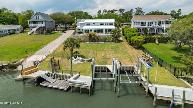 1205 Kings Lndg, Hampstead, NC 28443 - dock featuring a water view and boat lift