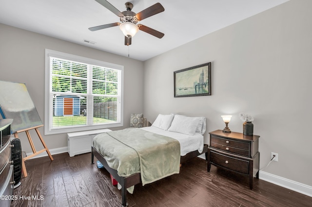 7869 Champlain Dr, Wilmington, NC 28412 - bedroom featuring baseboards, wood finished floors, and ceiling fan