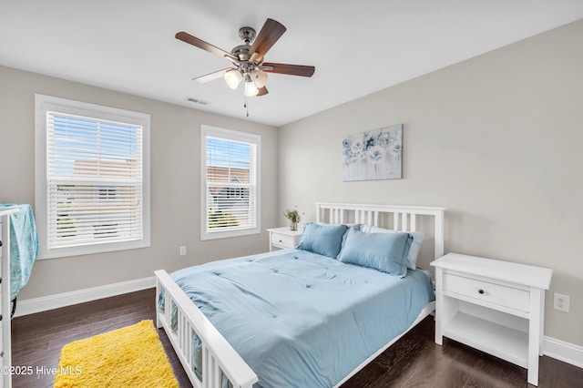 7869 Champlain Dr, Wilmington, NC 28412 - bedroom featuring wood finished floors, baseboards, and ceiling fan