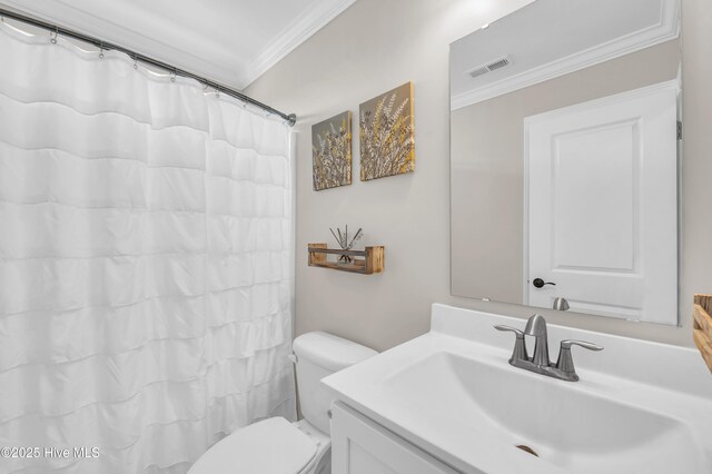 7869 Champlain Dr, Wilmington, NC 28412 - bathroom featuring ornamental molding, vanity, toilet, and a shower with curtain