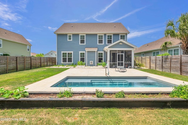 7869 Champlain Dr, Wilmington, NC 28412 - back of house featuring a sunroom and a patio area