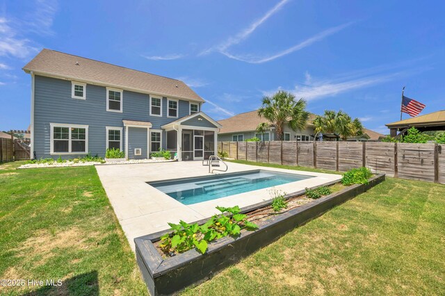 7869 Champlain Dr, Wilmington, NC 28412 - view of pool featuring a sunroom, a patio, and a garden