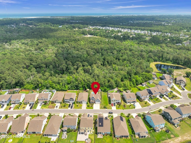 7869 Champlain Dr, Wilmington, NC 28412 - aerial overview of property's location with a forest and nearby suburban area