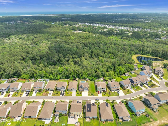 7869 Champlain Dr, Wilmington, NC 28412 - aerial view of property and surrounding area featuring a forest and nearby suburban area