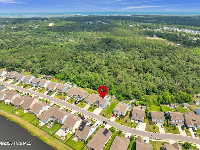 7869 Champlain Dr, Wilmington, NC 28412 - aerial view of property and surrounding area with a forest and nearby suburban area