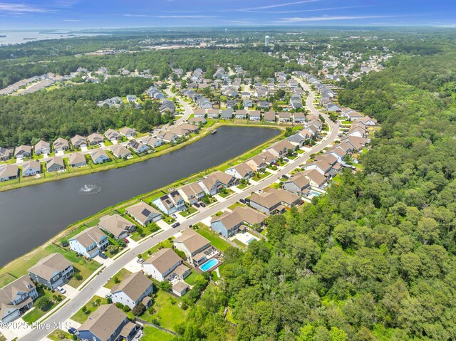 7869 Champlain Dr, Wilmington, NC 28412 - aerial view of property and surrounding area with nearby suburban area and a large body of water