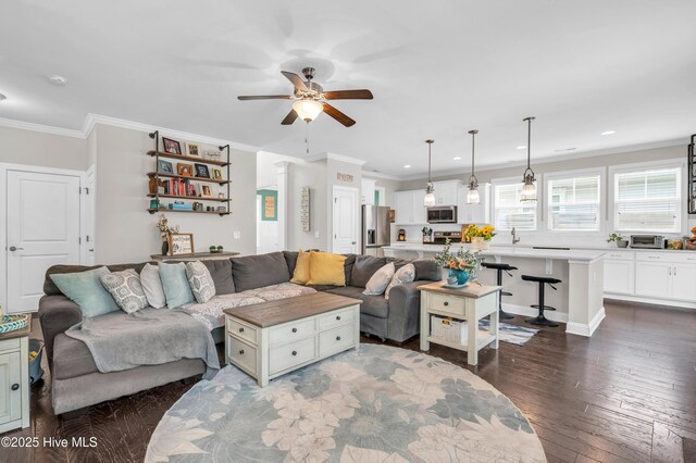7869 Champlain Dr, Wilmington, NC 28412 - living room with a ceiling fan, dark wood finished floors, recessed lighting, and ornamental molding