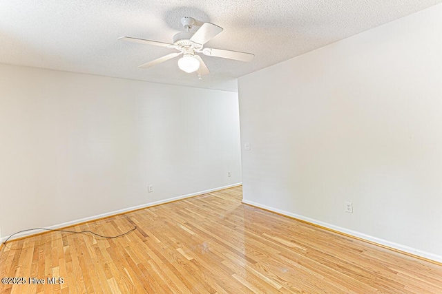 129 Shagbark Ct, Seven Lakes, NC 27376 - unfurnished room with light wood-style floors, ceiling fan, and a textured ceiling