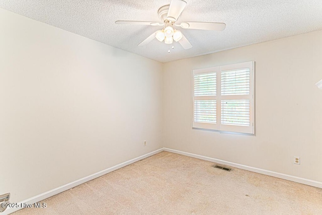 129 Shagbark Ct, Seven Lakes, NC 27376 - empty room with light carpet, a textured ceiling, and ceiling fan