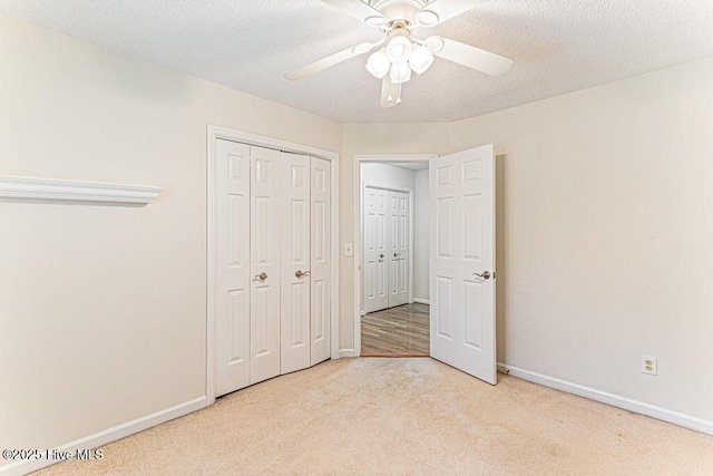 129 Shagbark Ct, Seven Lakes, NC 27376 - unfurnished bedroom featuring carpet flooring, a closet, and ceiling fan