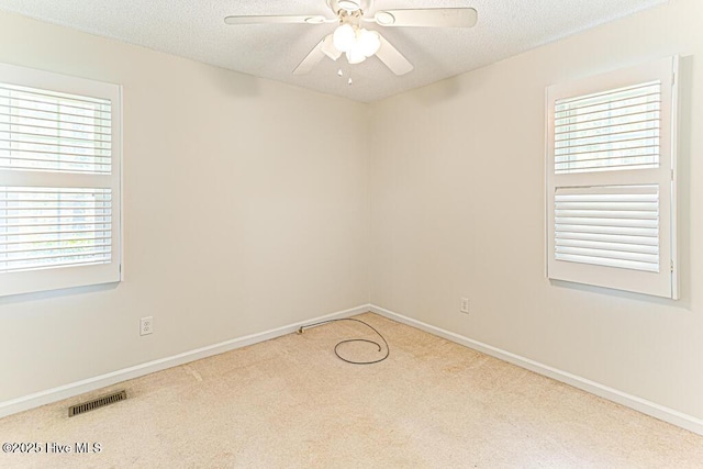 129 Shagbark Ct, Seven Lakes, NC 27376 - carpeted spare room featuring ceiling fan and a textured ceiling