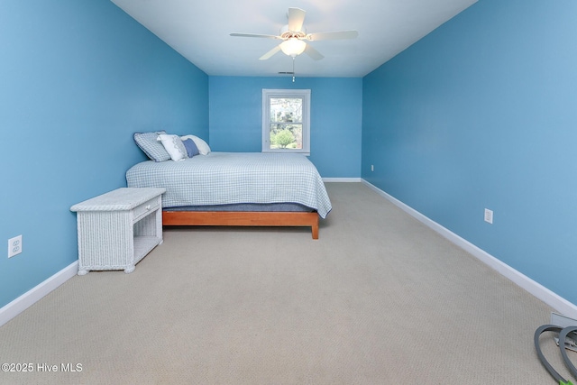 106 Sound Shore Dr, Currituck, NC 27929 - bedroom with baseboards, carpet, and a ceiling fan