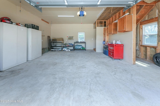 106 Sound Shore Dr, Currituck, NC 27929 - garage featuring a garage door opener