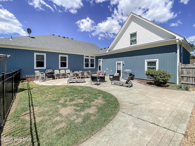 106 Sound Shore Dr, Currituck, NC 27929 - rear view of house featuring outdoor lounge area and a patio area