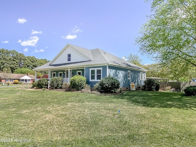 106 Sound Shore Dr, Currituck, NC 27929 - rear view of property with covered porch and a shingled roof