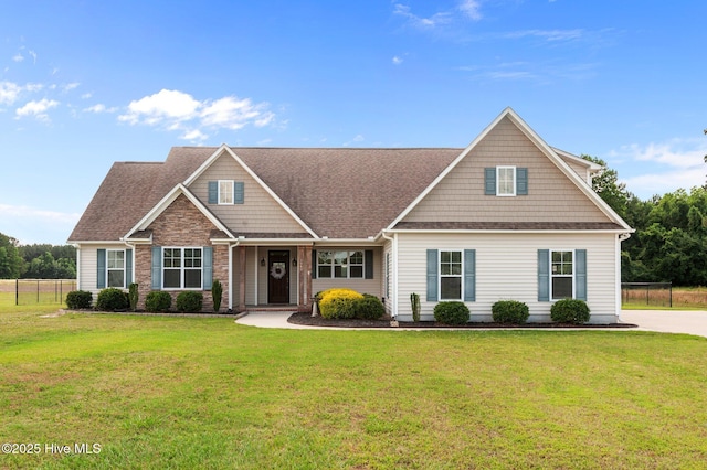 3068 Joe Stocks Rd, Greenville, NC 27858 - view of front of house with roof with shingles and stone siding