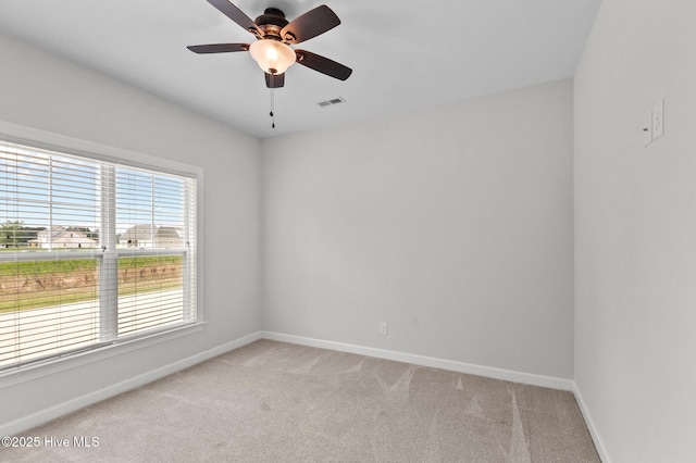 3068 Joe Stocks Rd, Greenville, NC 27858 - empty room with light carpet, baseboards, and a ceiling fan